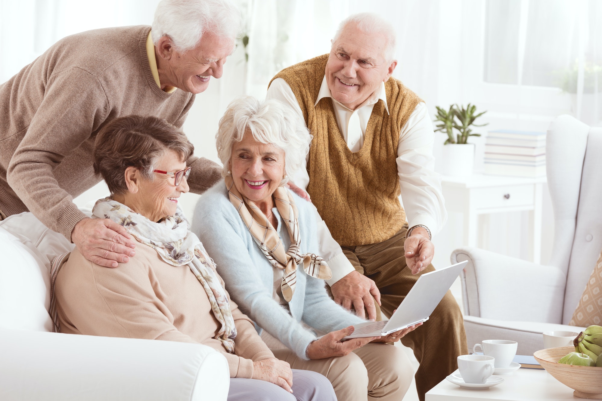 Elderly people enjoying modern technology